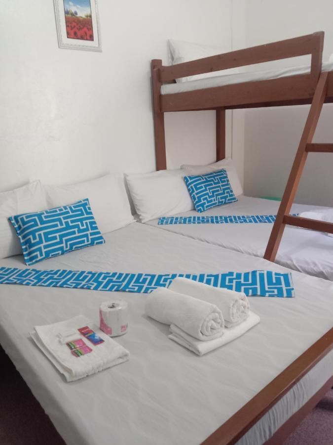 Bucana Beachfront Guesthouse El Nido Esterno foto